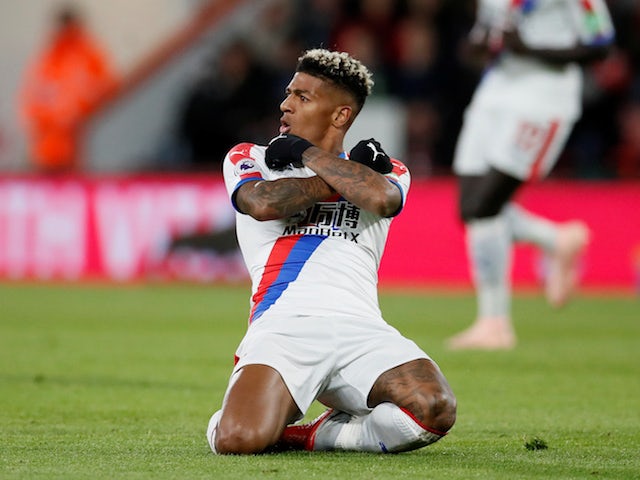 Crystal Palace full-back Patrick van Aanholt celebrates after scoring in his side's Premier League clash with Bournemouth on October 1, 2018