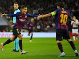 Barcelona midfielder Philippe Coutinho celebrates with Lionel Messi after scoring the opening goal in his side's Champions League clash with Tottenham Hotspur on October 3, 2018