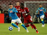 Liverpool winger Sadio Mane is chased by Napoli's Jose Callejon during their Champions League clash on October 3, 2018
