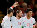 Spain captain Sergio Ramos celebrates with Rodri and Alvaro Morata after scoring during his side's international friendly with Wales on October 11, 2018