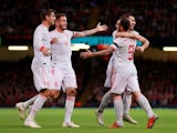 Spain players celebrate Paco Alcacer's opener against Wales on October 11, 2018