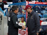David Wagner and Jurgen Klopp shake hands ahead of the Premier League clash between Huddersfield Town and Liverpool on October 20, 2018