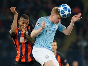 Kevin De Bruyne and Fernando in action during the Champions League group game between Shakhtar Donetsk and Manchester City on October 23, 2018