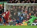 Liverpool forward Roberto Firmino scores the opener for his side during their Champions League clash with Red Star Belgrade on October 24, 2018