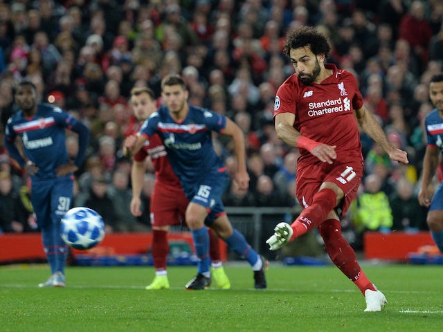 Mohamed Salah scores from the spot during the Champions League game between Liverpool and Red Star on October 24, 2018
