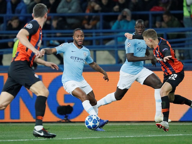 Raheem Sterling and Mykola Matviyenko in action during the Champions League group game between Shakhtar Donetsk and Manchester City on October 23, 2018