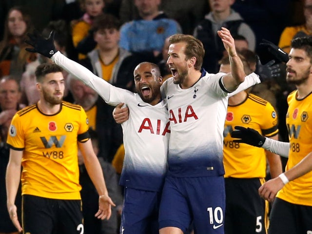 Lucas Moura celebrates with Harry Kane after scoring Tottenham Hotspur's second goal against Wolverhampton Wanderers on November 3, 2018