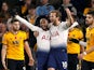 Lucas Moura celebrates with Harry Kane after scoring Tottenham Hotspur's second goal against Wolverhampton Wanderers on November 3, 2018