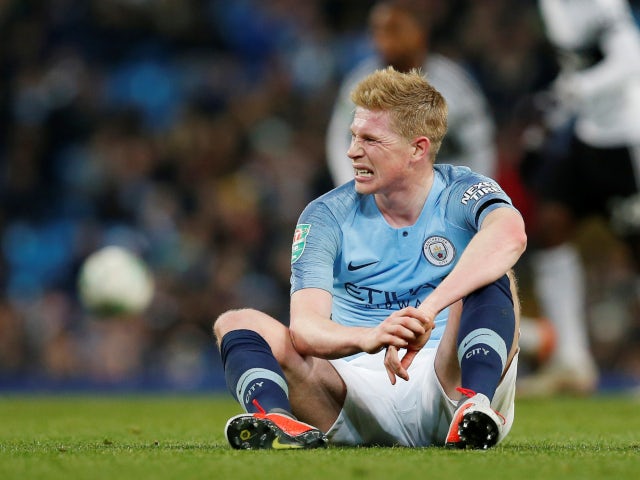 Kevin De Bruyne is left floored following a tussle with Timothy Fosu-Mensah in Manchester City's EFL Cup tie with Fulham on November 1, 2018