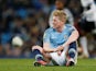 Kevin De Bruyne is left floored following a tussle with Timothy Fosu-Mensah in Manchester City's EFL Cup tie with Fulham on November 1, 2018