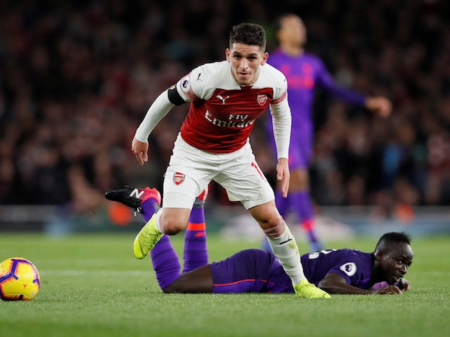 Lucas Torreira and Sadio Mane in action during the Premier League game between Arsenal and Liverpool on November 3, 2018