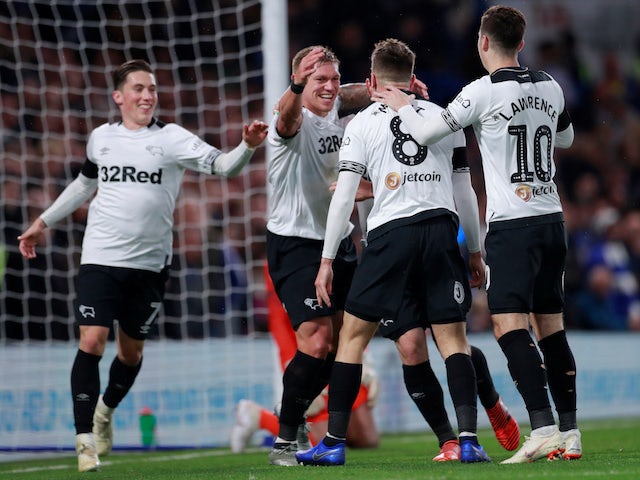 Derby County's Martyn Waghorn celebrates with teammates after scoring for his side against Chelsea on October 31, 2018