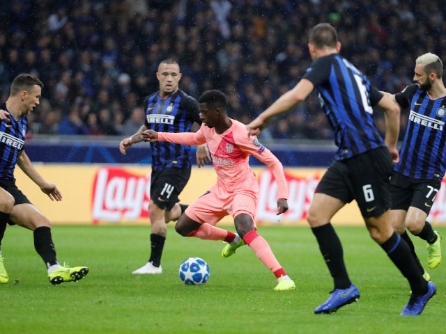 Barcelona forward Ousmane Dembele wriggles away from four Inter Milan players on November 6, 2018