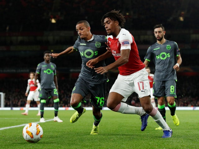 Sporting Lisbon's Bruno Gaspar in action with Arsenal's Alex Iwobi in the sides' goalless draw on November 8, 2018