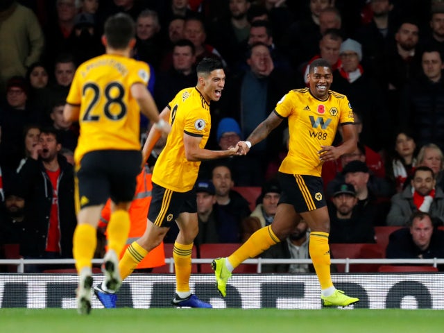 Ivan Cavaleiro celebrates with Raul Jimenez after opening the scoring for Wolverhampton Wanderers against Arsenal on November 11, 2018