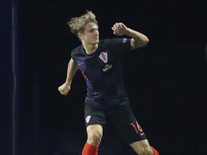Jedvaj nets last-gasp winner as Croatia beat Spain to set up England showdown