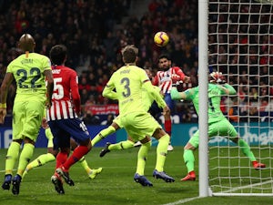 Atletico Madrid forward Diego Costa scores against Barcelona
