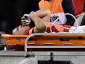Wales' Ellis Jenkins receives oxygen as he leaves the pitch on a stretcher after sustaining an injury on November 24, 2018