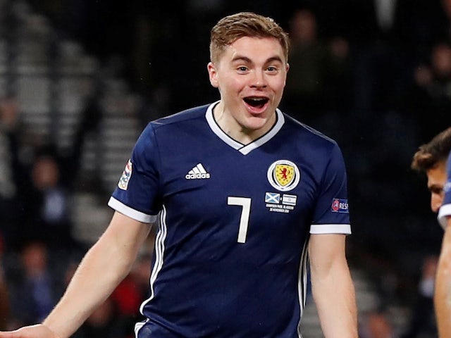 James Forrest expects Celtic to handle the pressure of chasing their rivals