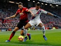 Manchester United's Matteo Darmian battles with Crystal Palace defender Patrick van Aanholt during their Premier League clash on November 24, 2018