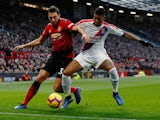 Manchester United's Matteo Darmian battles with Crystal Palace defender Patrick van Aanholt during their Premier League clash on November 24, 2018