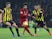 Liverpool's Mohamed Salah flanked by two Watford players during their Premier League clash on November 24, 2018