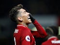 Liverpool's Roberto Firmino celebrates after scoring during his side's Premier League clash with Watford on November 24, 2018