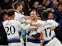 Christian Eriksen is joined in celebration by his Tottenham Hotspur teammates after opening the scoring against Inter Milan on November 28, 2018