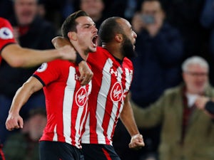 Cedric Soares celebrates Southampton's second goal against Manchester United with teammate Nathan Redmond