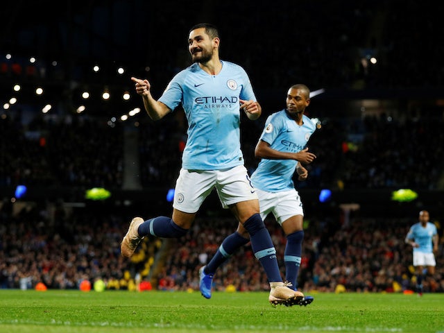 Ilkay Gundogan celebrates scoring his side's third during the Premier League game between Manchester City and Bournemouth on December 1, 2018
