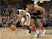 Milwaukee Bucks' Khris Middleton and Chicago Bulls' Jabari Parker in action on November 28, 2018