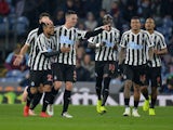Newcastle United's Ciaran Clark celebrates scoring their second goal against Burnley with teammates on November 26, 2018