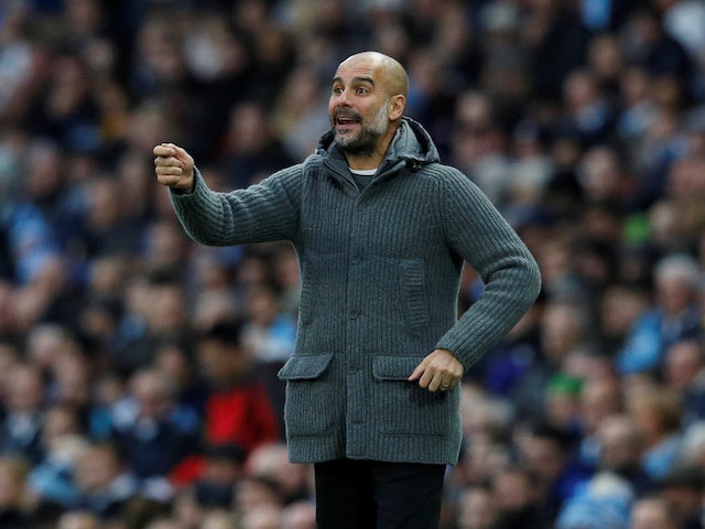 Pep Guardiola watches on during the Premier League game between Manchester City and Bournemouth on December 1, 2018