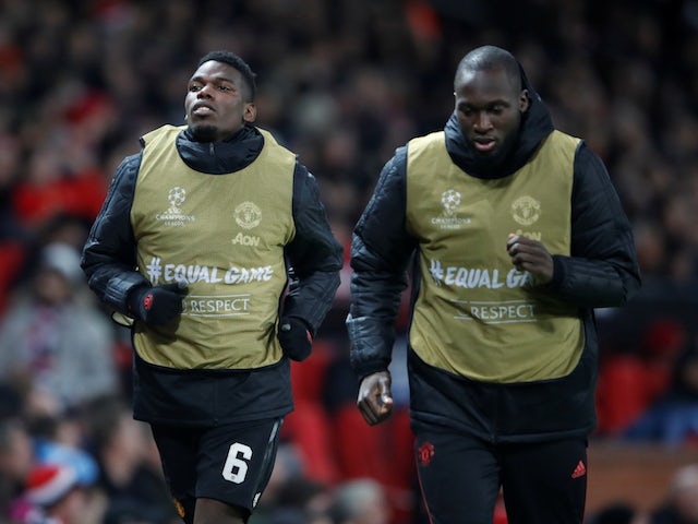 Manchester United duo Paul Pogba and Romelu Lukaku warm up during the Champions League clash with Young Boys on November 27, 2018