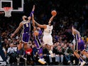 Los Angeles Lakers center Tyson Chandler and guard Josh Hart defend on a shot from Denver Nuggets forward Trey Lyles in the third quarter at the Pepsi Center