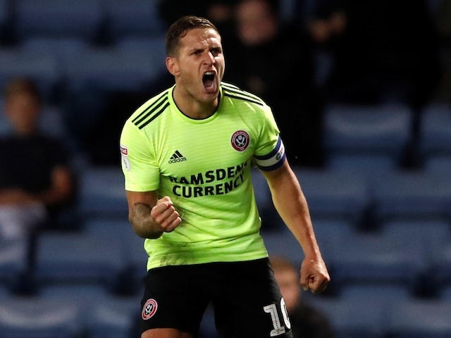 Sheffield United up to third with late double