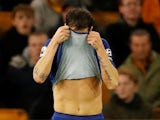 Cesc Fabregas reacts with shame during the Premier League game between Wolverhampton Wanderers and Chelsea on December 5, 2018