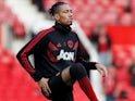Chris Smalling warms up for Manchester United on November 24, 2018