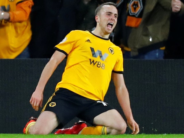 Diogo Jota celebrates his magnificent winner during the Premier League game between Wolverhampton Wanderers and Chelsea on December 5, 2018
