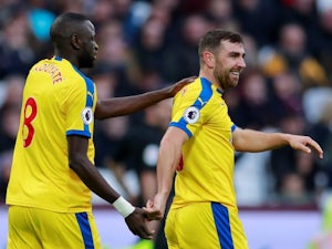 Crystal Palace's James McArthur celebrates with Cheikhou Kouyate after scoring their first goal against West Ham United on December 8, 2018