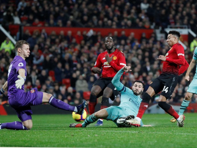 Manchester United's Jesse Lingard scores against Arsenal in the Premier League on December 5, 2018.