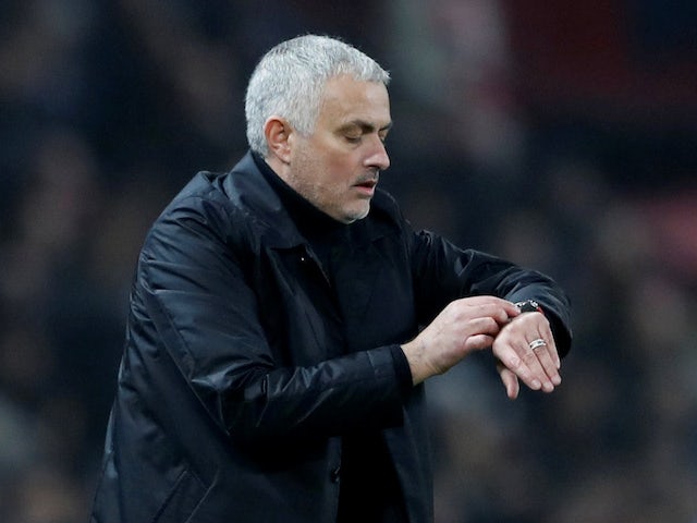 Manchester United manager Jose Mourinho checks his watch on December 5, 2018