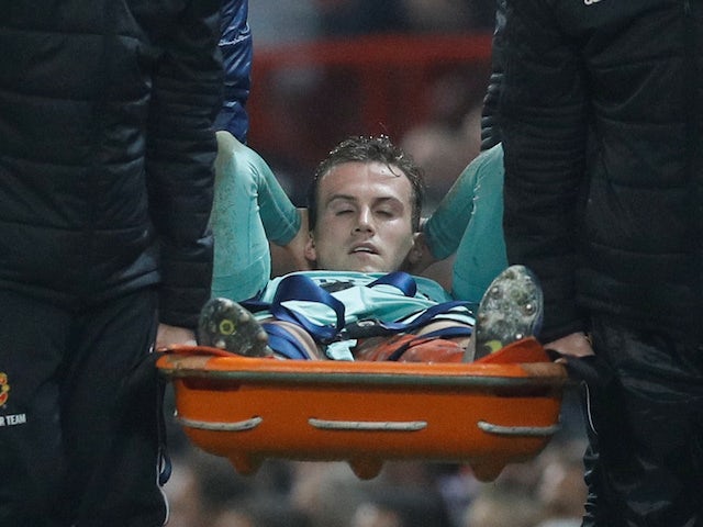 Rob Holding is stretchered off for Arsenal on December 5, 2018