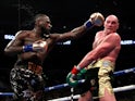 Tyson Fury and Deontay Wilder in action on December 1, 2018