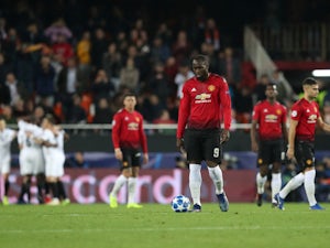 Manchester United's players react to falling behind against Valencia in their Champions League tie on December 12, 2018