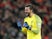 Alisson celebrates during the Premier League game between Liverpool and Manchester United on December 16, 2018