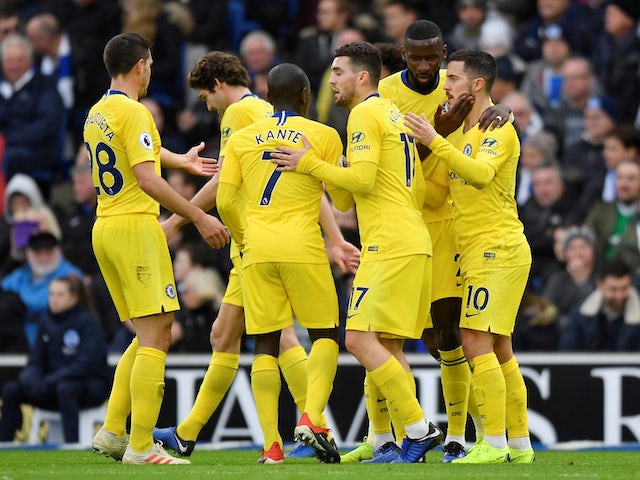 A group of Chelsea players celebrate the second goal during their game at Brighton on December 16, 2018