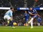 Dominic Calvert-Lewin shoots past Kyle Walker during the Premier League game between Manchester City and Everton on December 15, 2018