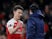 Unai Emery greets Laurent Koscielny on the sidelines during Arsenal's Europa League tie with Qarabag FK on December 13, 2018