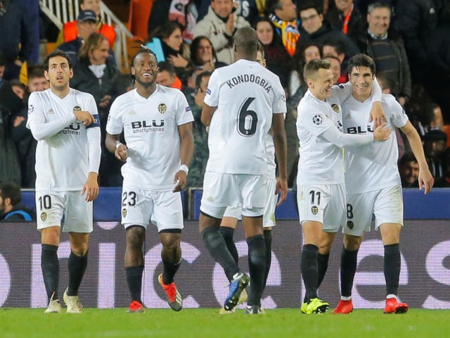 Michy Batshuayi and his teammates celebrate Valencia's second goal against Manchester United in their Champions League tie on December 12, 2018